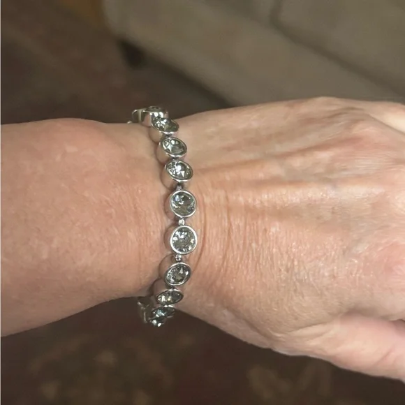 Touchstone Crystal Silver Tennis Bracelet - Picture 1 of 7